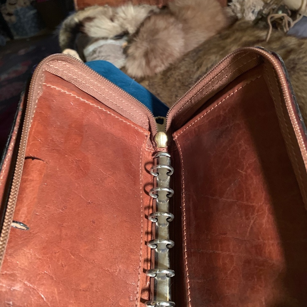 Small spiral leather clutch